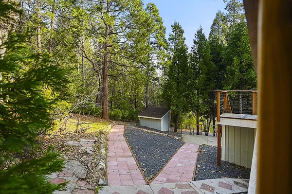 a backyard of a house with lots of green space