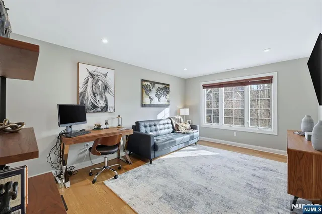 a workspace with furniture and a window