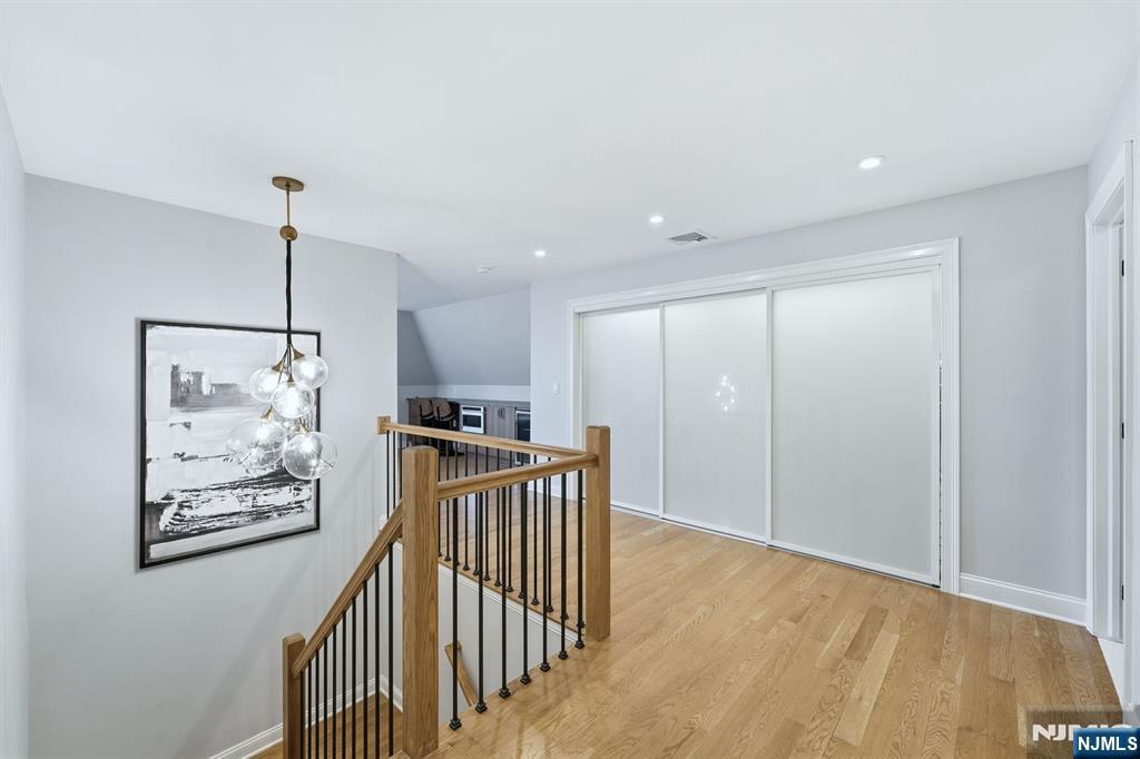 204 Bearwoods Road Park Ridge, NJ 07656 - Photo 23 of 39 a view of hallway with wooden floor