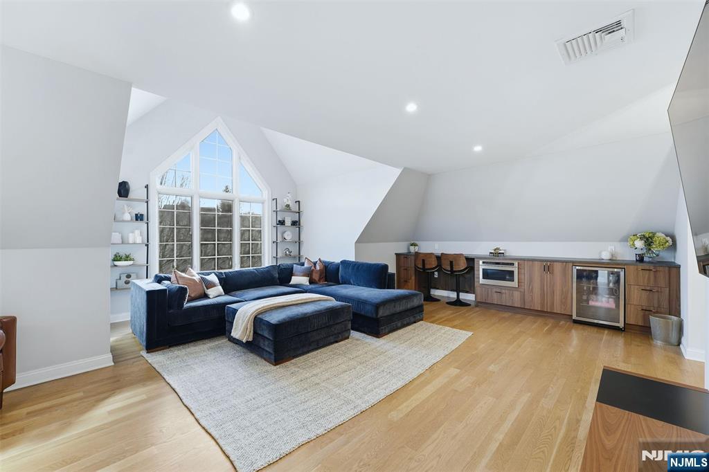 204 Bearwoods Road Park Ridge, NJ 07656 - Photo 25 of 39 a bedroom with furniture and a large window