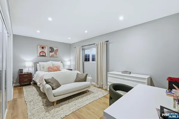 a bedroom with furniture and a couch