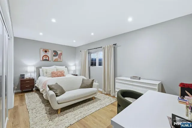 a bedroom with furniture and a couch