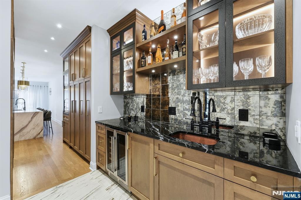 204 Bearwoods Road Park Ridge, NJ 07656 - Photo 9 of 39 a kitchen with stainless steel appliances granite countertop a stove and a sink
