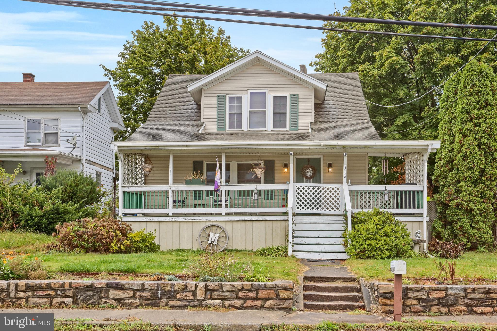 318 West Main Street Valley View, PA 17983 - Photo 2 of 46 a front view of a house with a yard