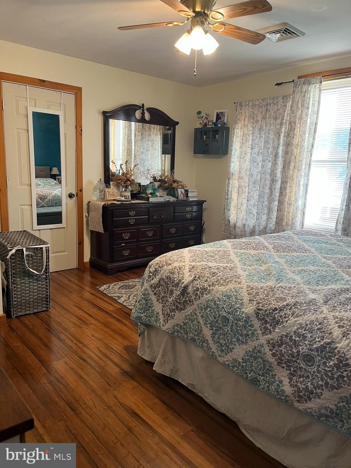 318 West Main Street Valley View, PA 17983 - Photo 21 of 46 a bedroom with a bed and wooden floor