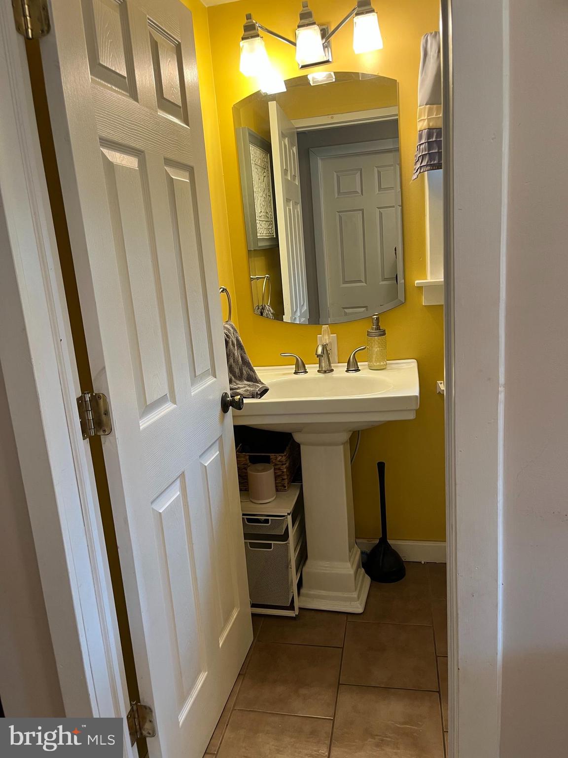 318 West Main Street Valley View, PA 17983 - Photo 23 of 46 a bathroom with a sink toilet and mirror