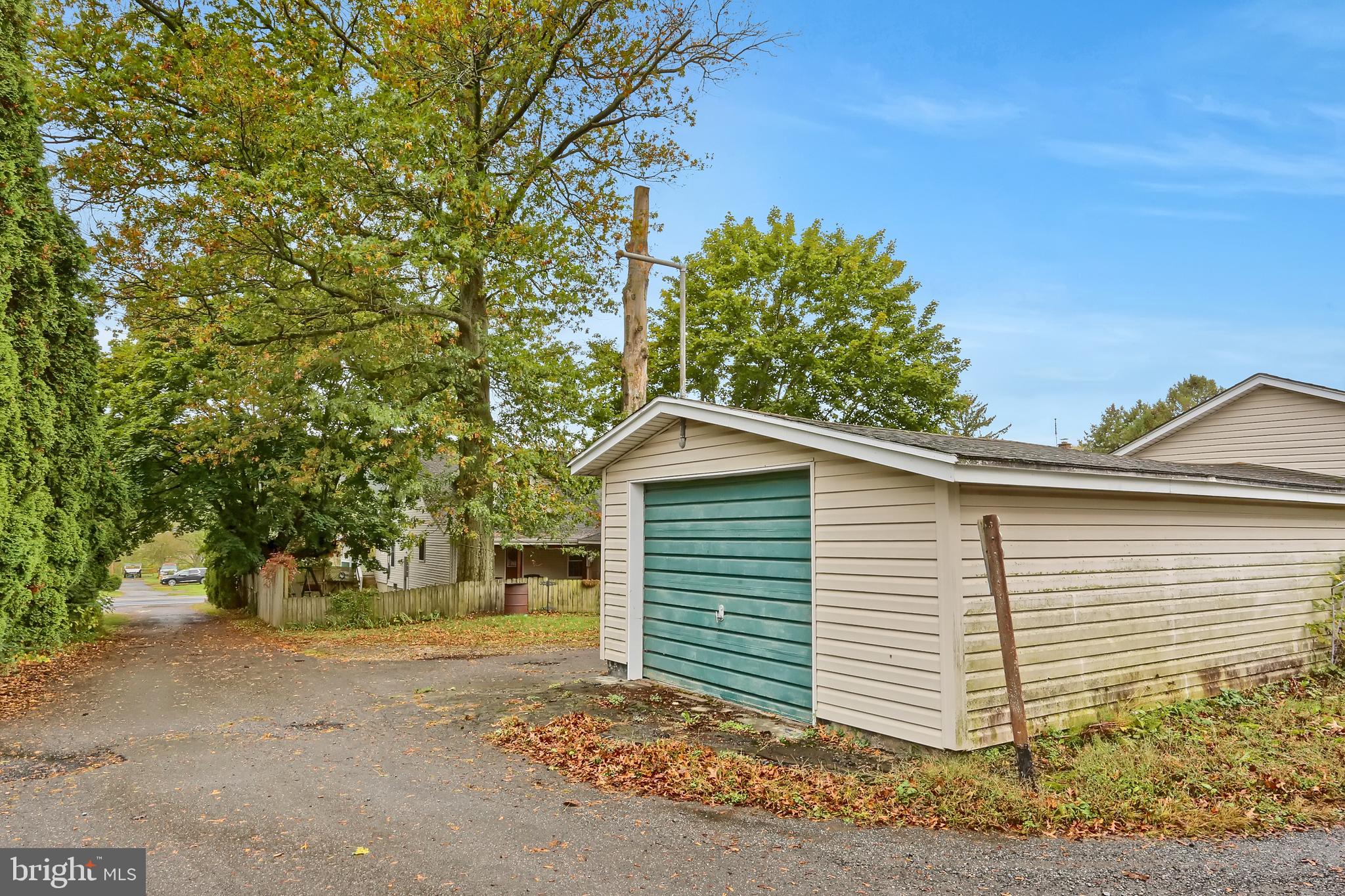 318 West Main Street Valley View, PA 17983 - Photo 46 of 46 a front view of a house with a garden
