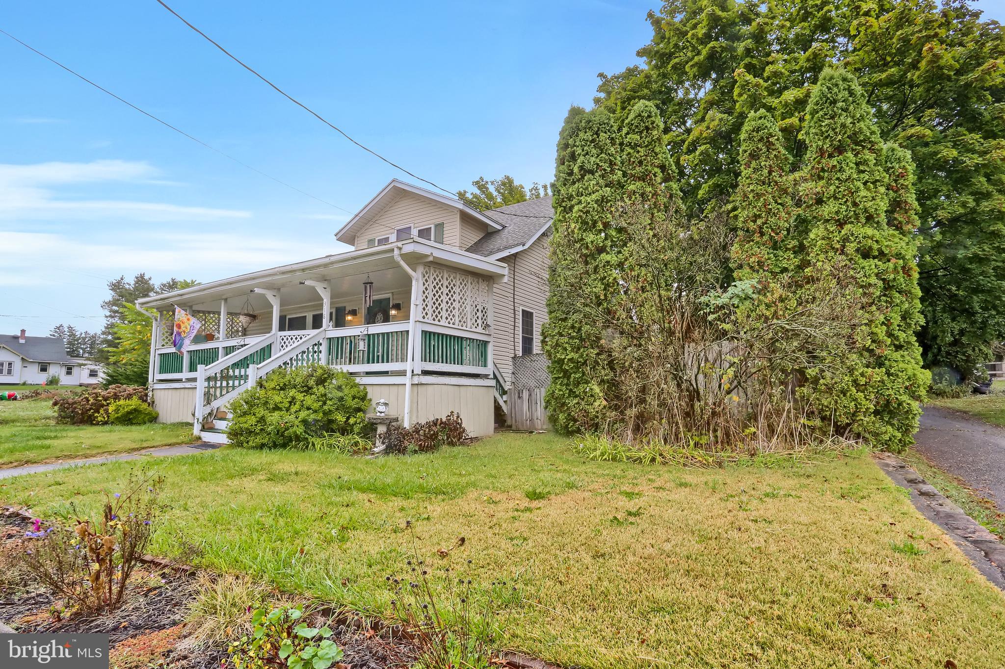 318 West Main Street Valley View, PA 17983 - Photo 5 of 46 a front view of a house with garden