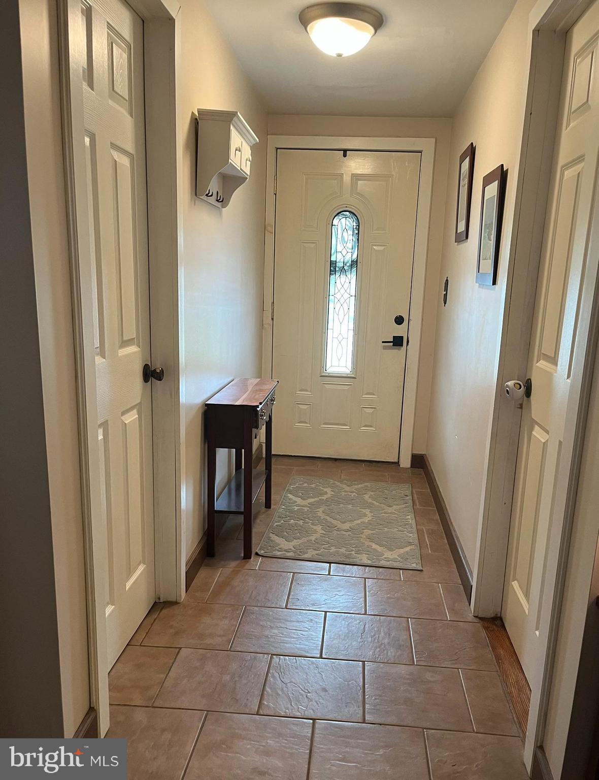 318 West Main Street Valley View, PA 17983 - Photo 7 of 46 a view of a hallway to rooms and stairs