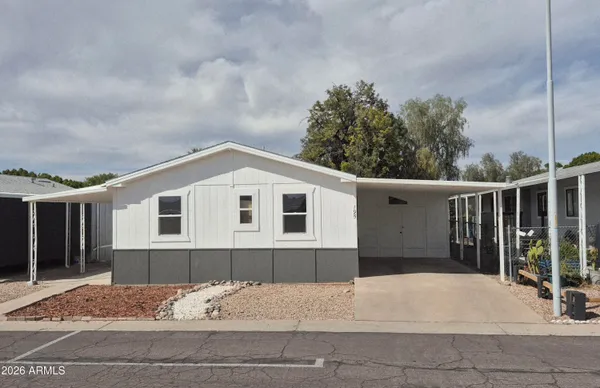 a front view of a house with yard