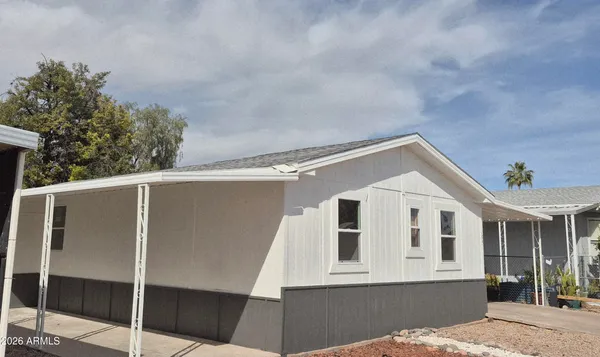 a view of a house with a garage