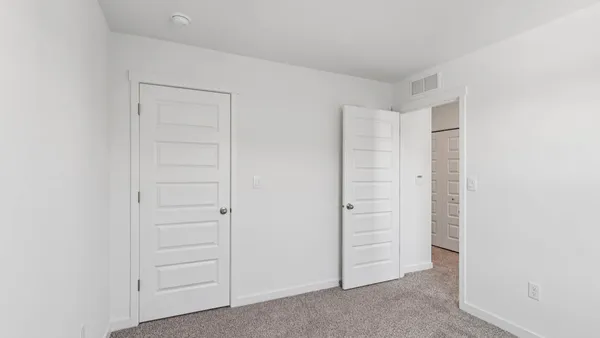 an empty room with closet