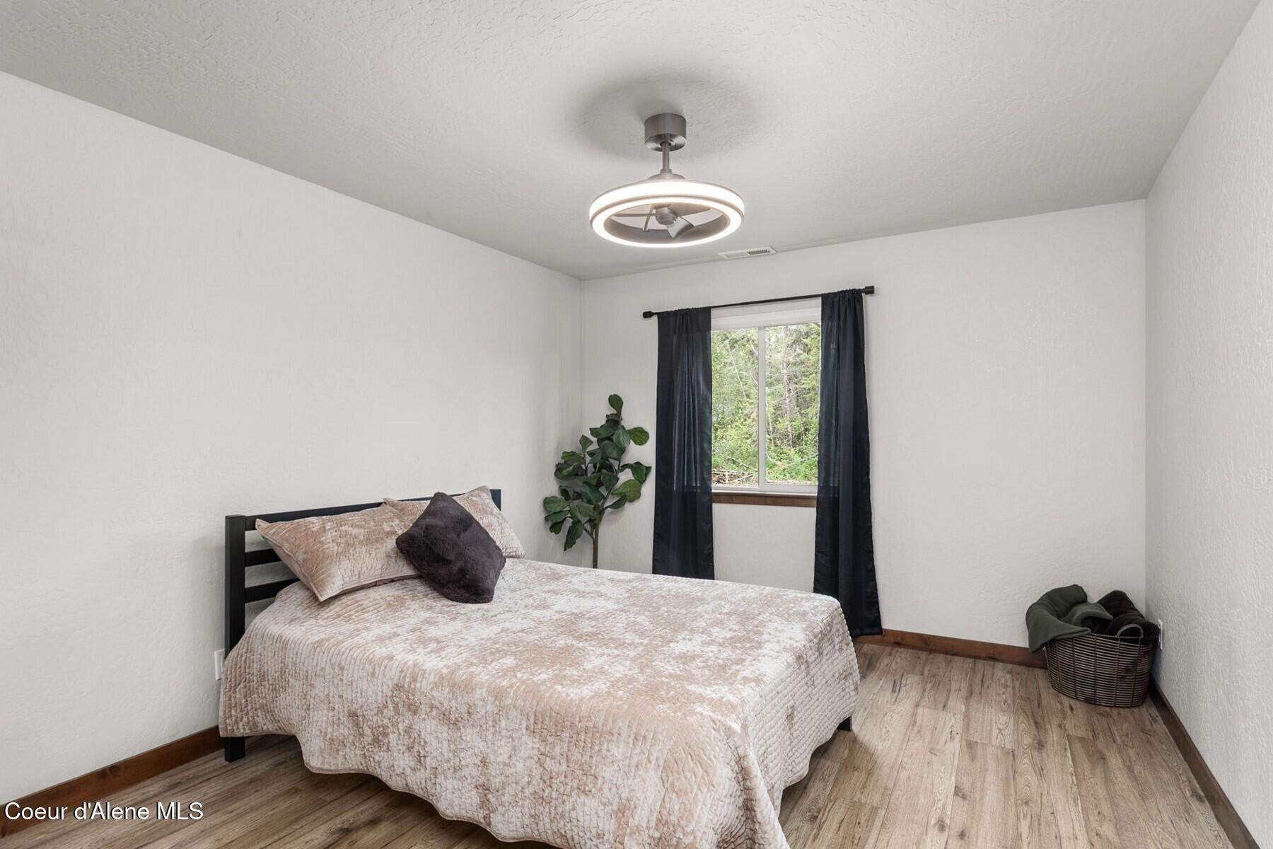 5240 Vay Road Priest River, ID 83856 - Photo 16 of 24 016_27webormlsBedroom2