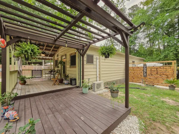 a view of a backyard with sitting area