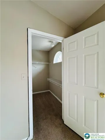 an empty room with a hallway
