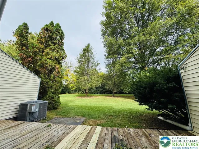 a view of a backyard with a garden