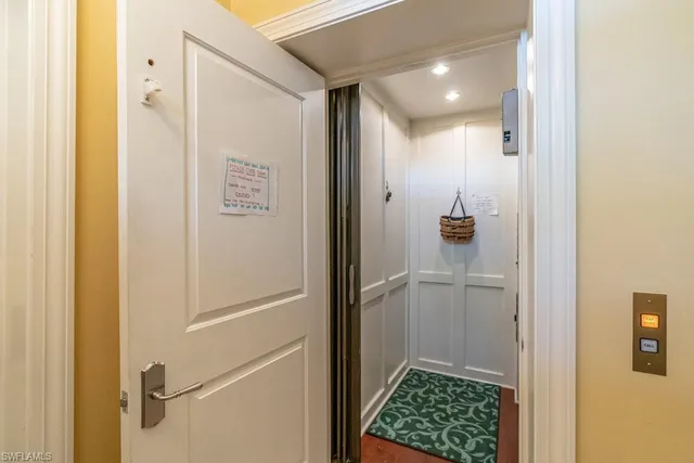 a large kitchen with kitchen island a large counter space a sink and stainless steel appliances