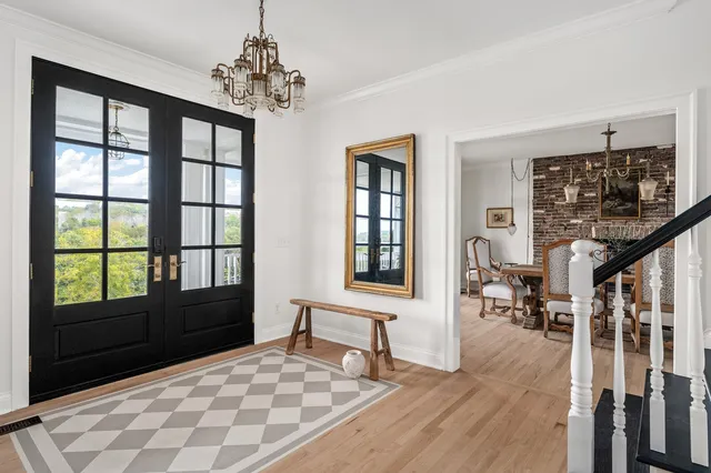 a bathroom with a sink and mirror