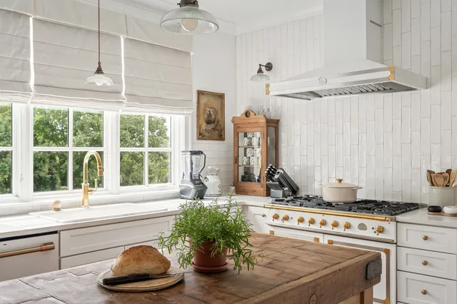 a spacious bathroom with a bathtub and window