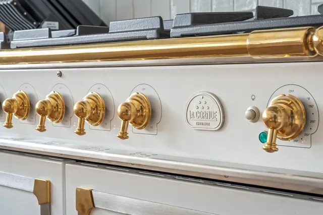 a view of a hallway with windows and stairs