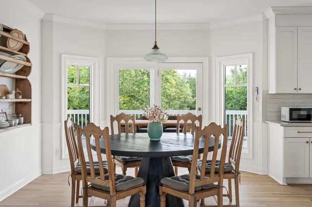 a view of a balcony with chairs