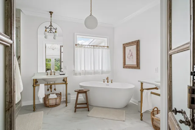 an aerial view of a houses with a yard