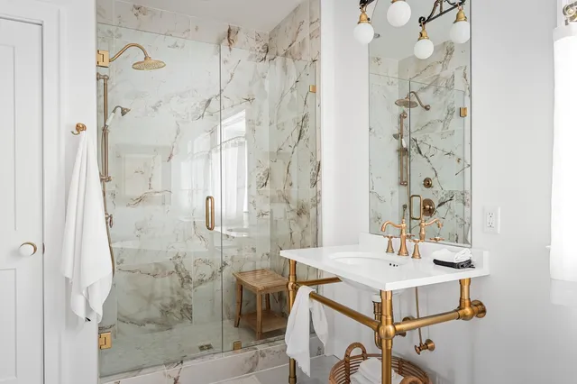 a view of a swimming pool with a yard and mountain view