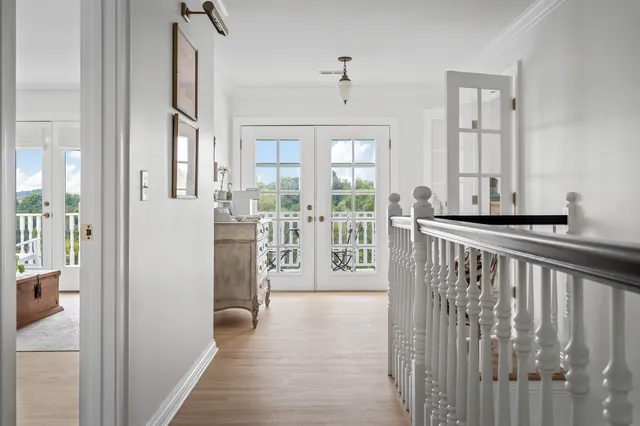 an aerial view of a house with outdoor space patio and ocean view