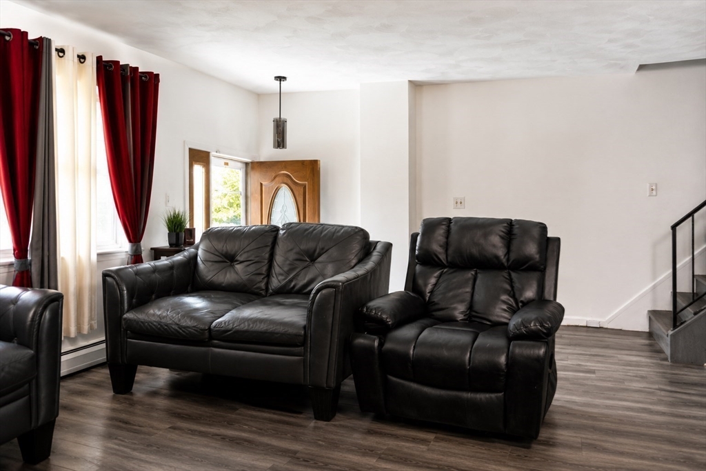 18 Ralston Road Boston, MA 02136 - Photo 7 of 26 a living room with furniture and a flat screen tv