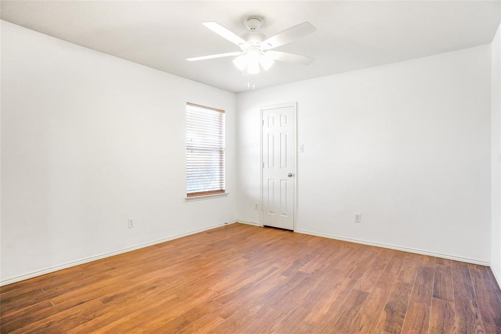9907 Divine Court Frisco, TX 75033 - Photo 22 of 31 Unfurnished room with light wood-type flooring and ceiling fan