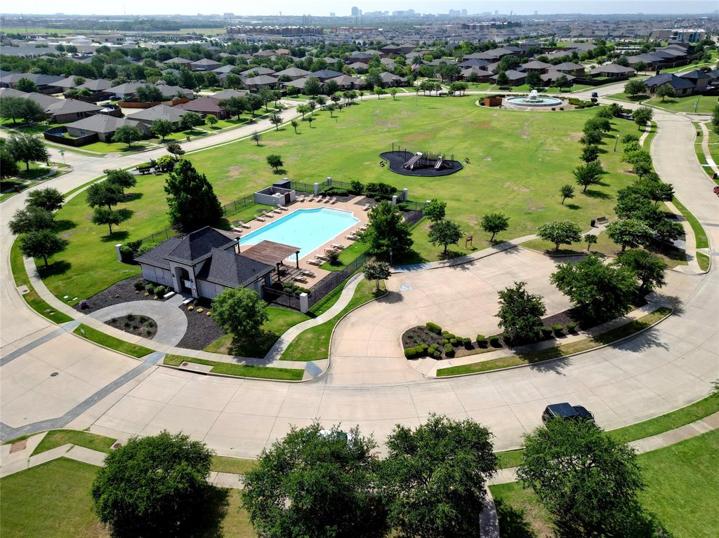 9907 Divine Court Frisco, TX 75033 - Photo 31 of 31 Aerial view of residential area with a pool area