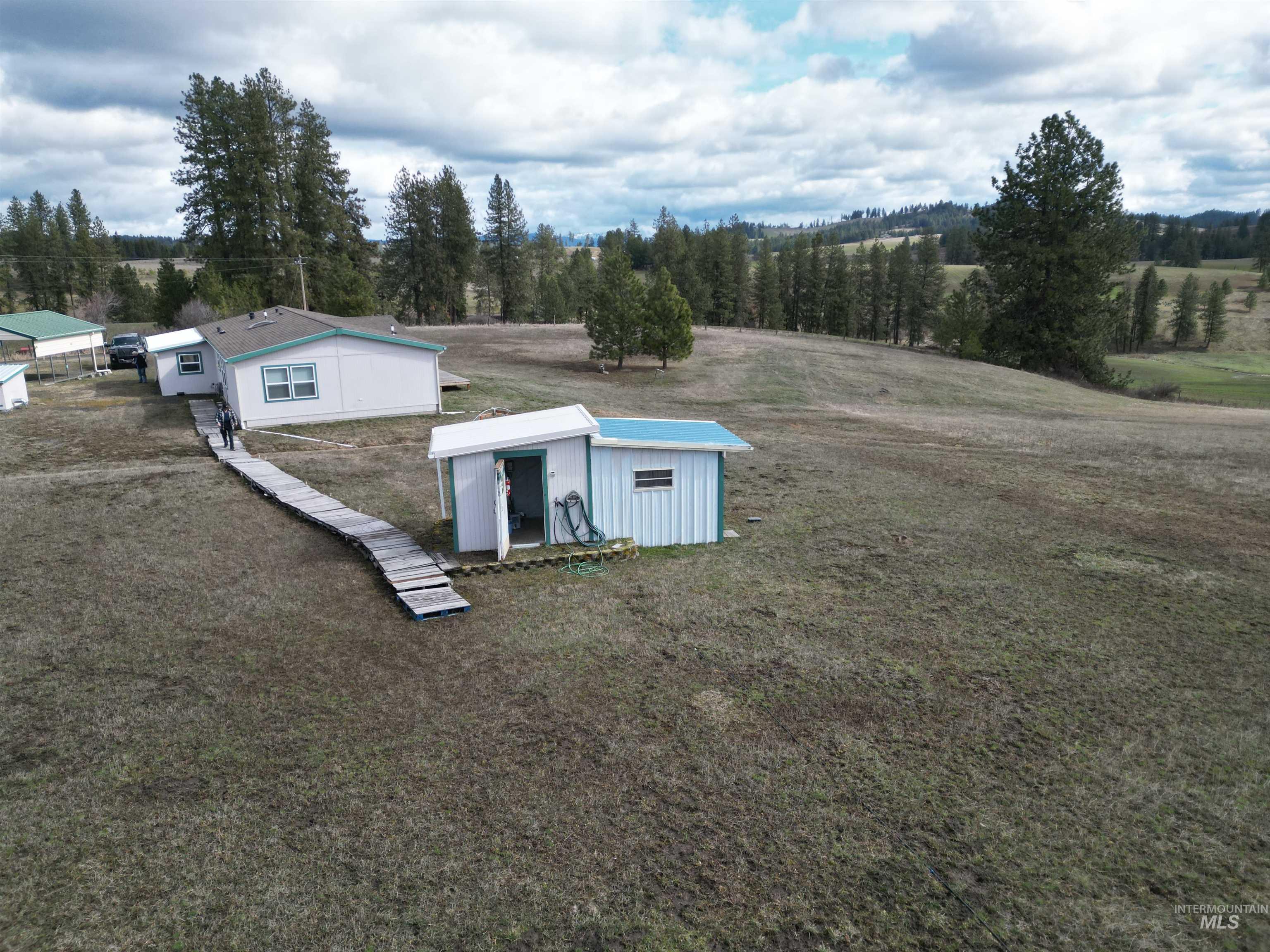 135 Harrisburg Road Kamiah, ID 83536 - Photo 2 of 30 Exterior space with a storage unit