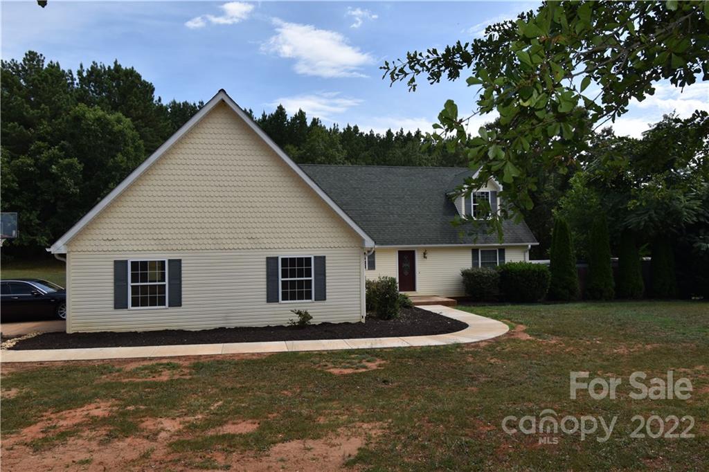 145 Stoneway Lane Rutherfordton, NC 28139 - Photo 2 of 3 a view of a house with a yard