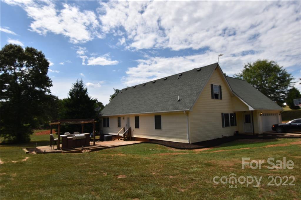 145 Stoneway Lane Rutherfordton, NC 28139 - Photo 3 of 3 a view of a house with swimming pool and sitting area