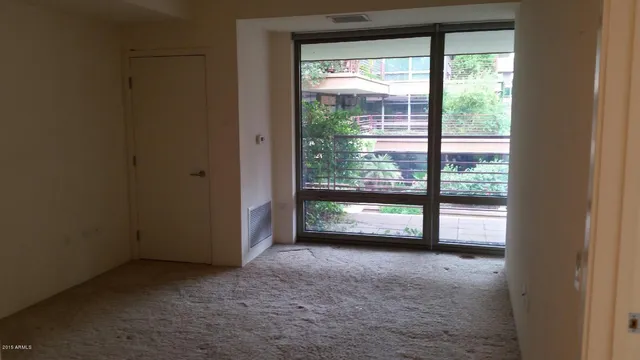 a view of empty room with front door