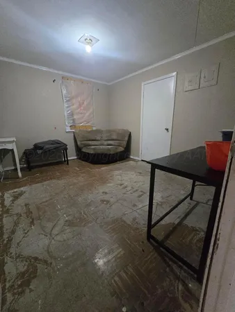 a utility room with cabinets dryer and washer