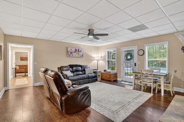 8179 Pineview Court Villa Rica, GA 30180 - Photo 20 of 41 a living room with furniture and wooden floor