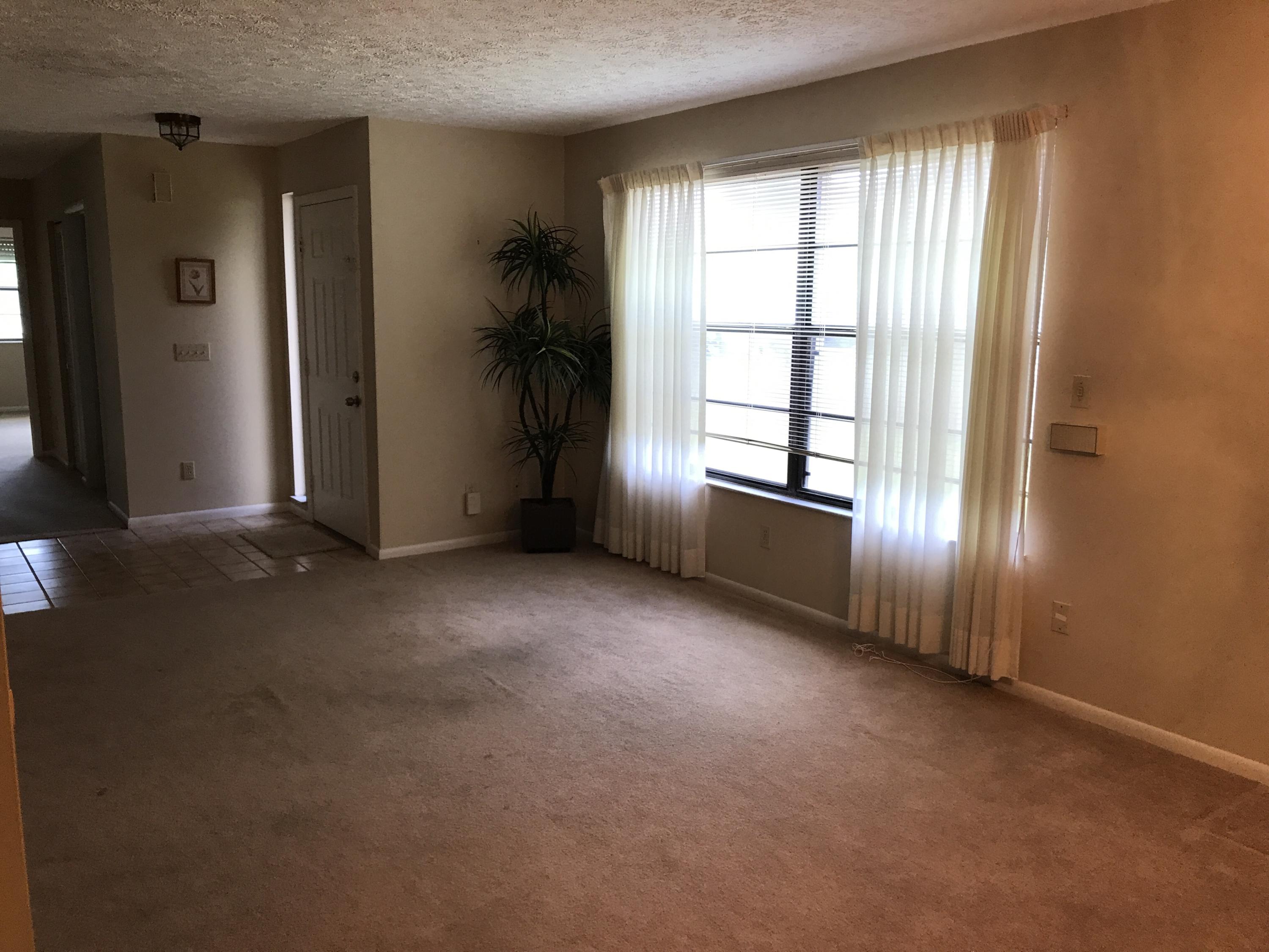 2060 Colonial Road, Unit 6 Fort Pierce, FL 34950 - Photo 4 of 23 Living Room (2)