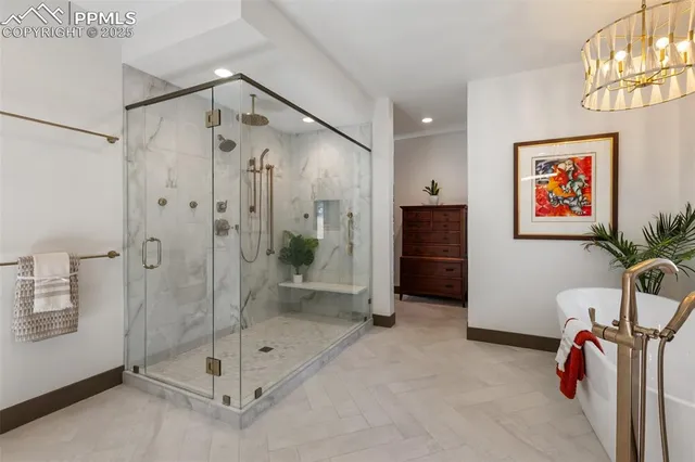 a bathroom with a shower and a sink