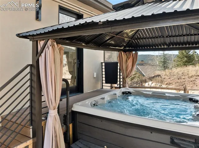 a view of a backyard of the house