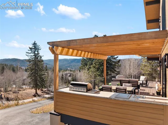 a view of a terrace with seating area