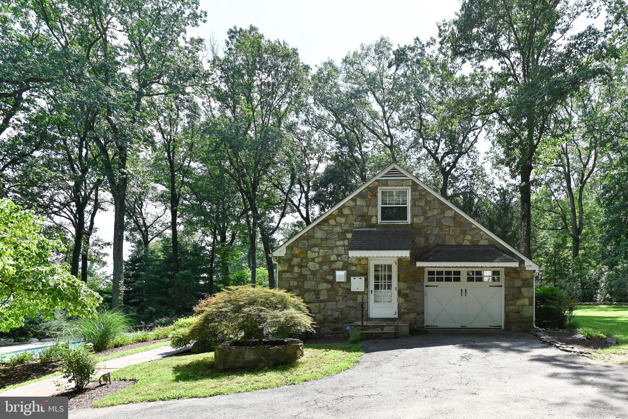 1531 North Ridge Road Perkasie, PA 18944 - Photo 30 of 30 a front view of a house with a garden