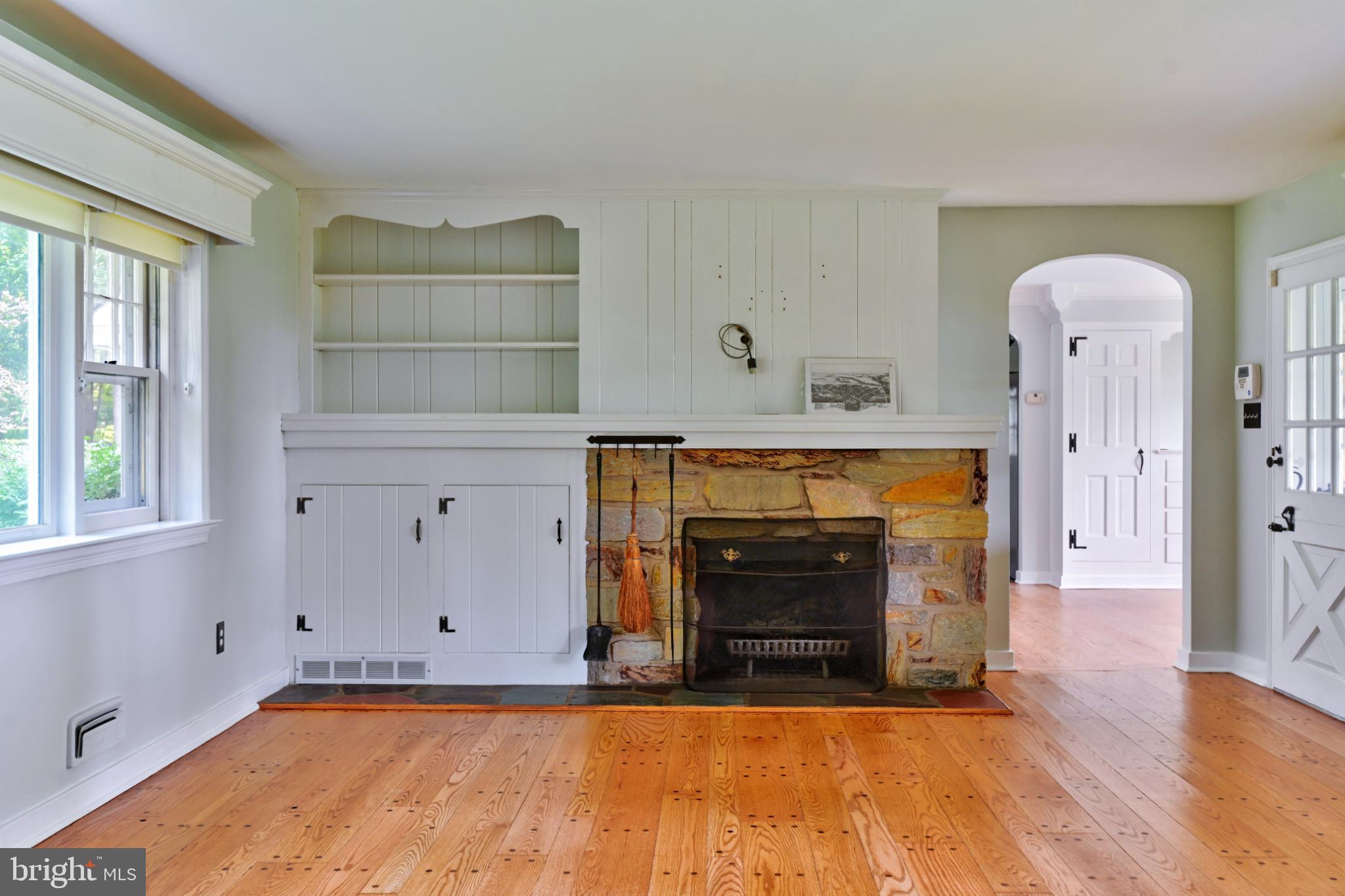 1531 North Ridge Road Perkasie, PA 18944 - Photo 9 of 30 a view of empty room with wooden floor and fireplace