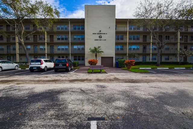 a cars parked in front of a building