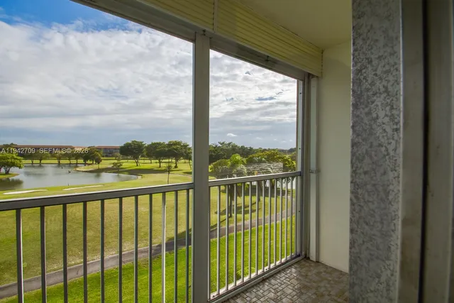 a view of a balcony with lake view