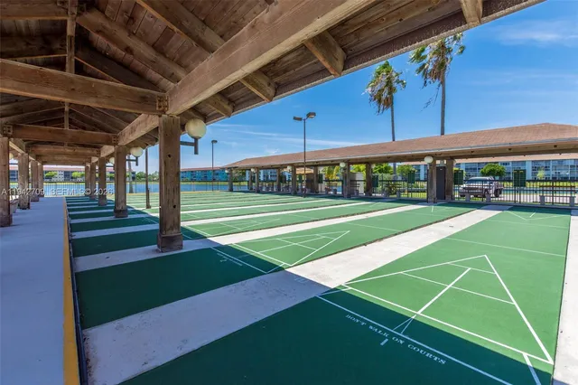 a view of a lake with a sitting area
