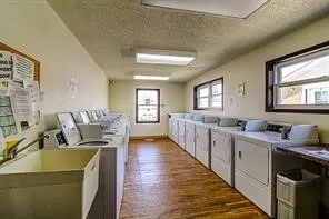 a living room with furniture and windows