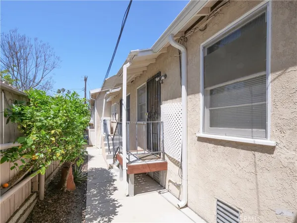 a view of balcony with furniture