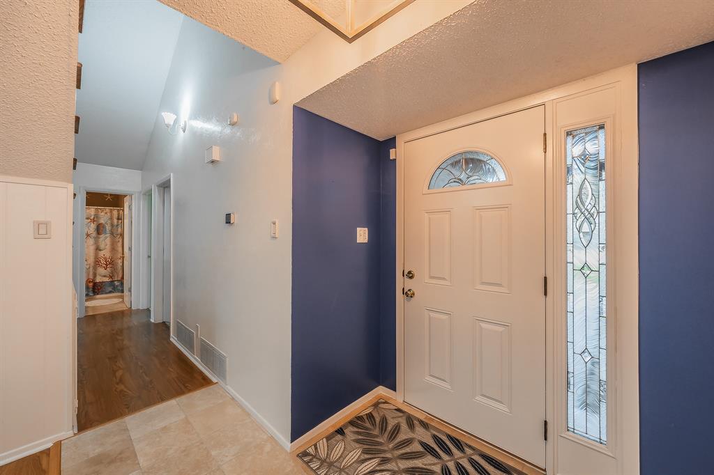 2003 Edgebrook Court Arlington, TX 76015 - Photo 11 of 40 a view of hallway with wooden floor