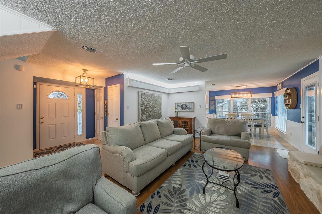 2003 Edgebrook Court Arlington, TX 76015 - Photo 16 of 40 a living room with furniture and a ceiling fan